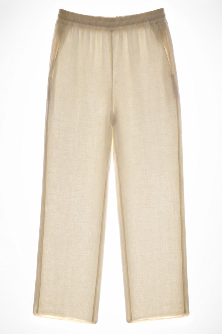 Cropped Trouser held against a lightbox. The cloth reads as opaque.