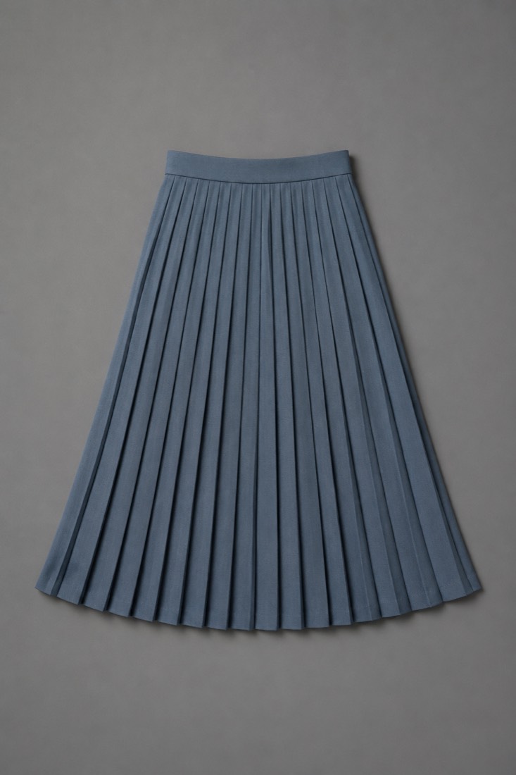 Pleated Skirt Long in Ash Blue, laid flat.