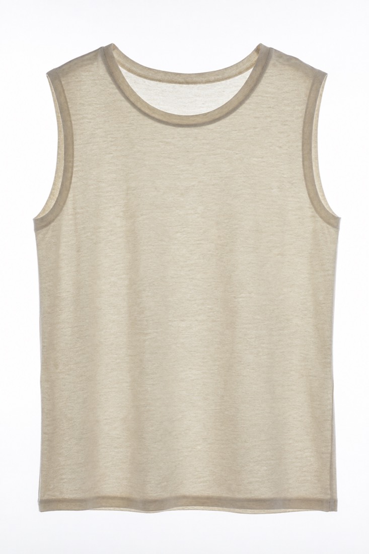Sleeveless Shell Top photographed against a backlight so the opacity of the cloth is visible.