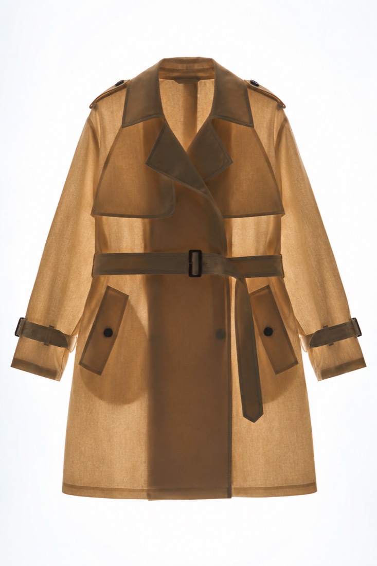 Trench Coat Short photographed against a backlight so the opacity of the cloth is visible.